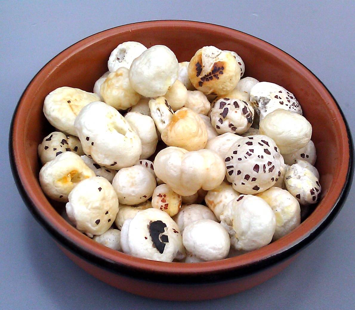 In Brown Bowl, full with Roasted Lotus Seeds - Healthy Indian Snacks List 