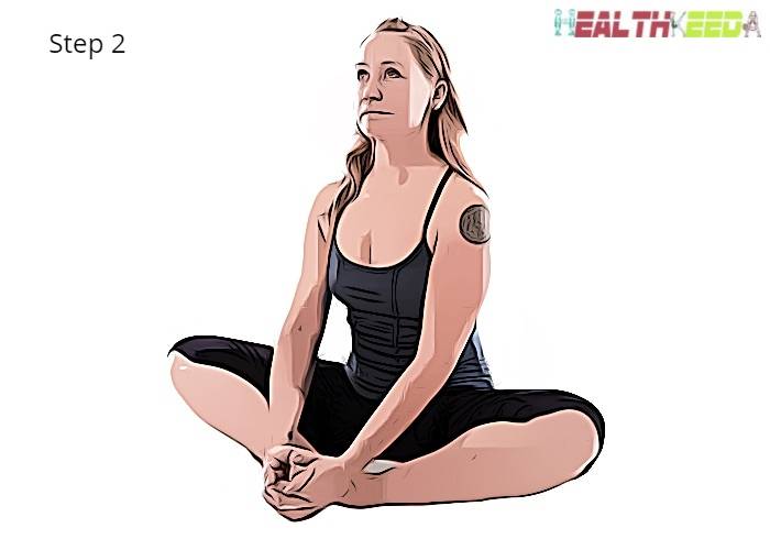 Step - 2 Baddha Konsana (Bound Angle Pose). Girl sitting and her feet sole touching each other