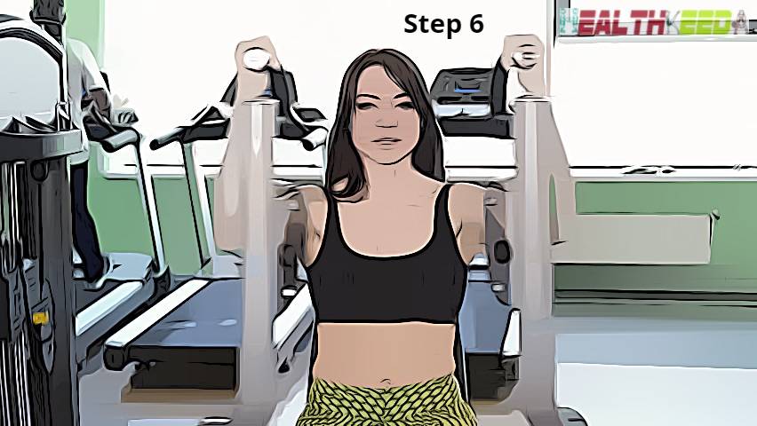 Step 6  - Press your arms in front of chest  - Pec Deck butterfly breast reduction exercise